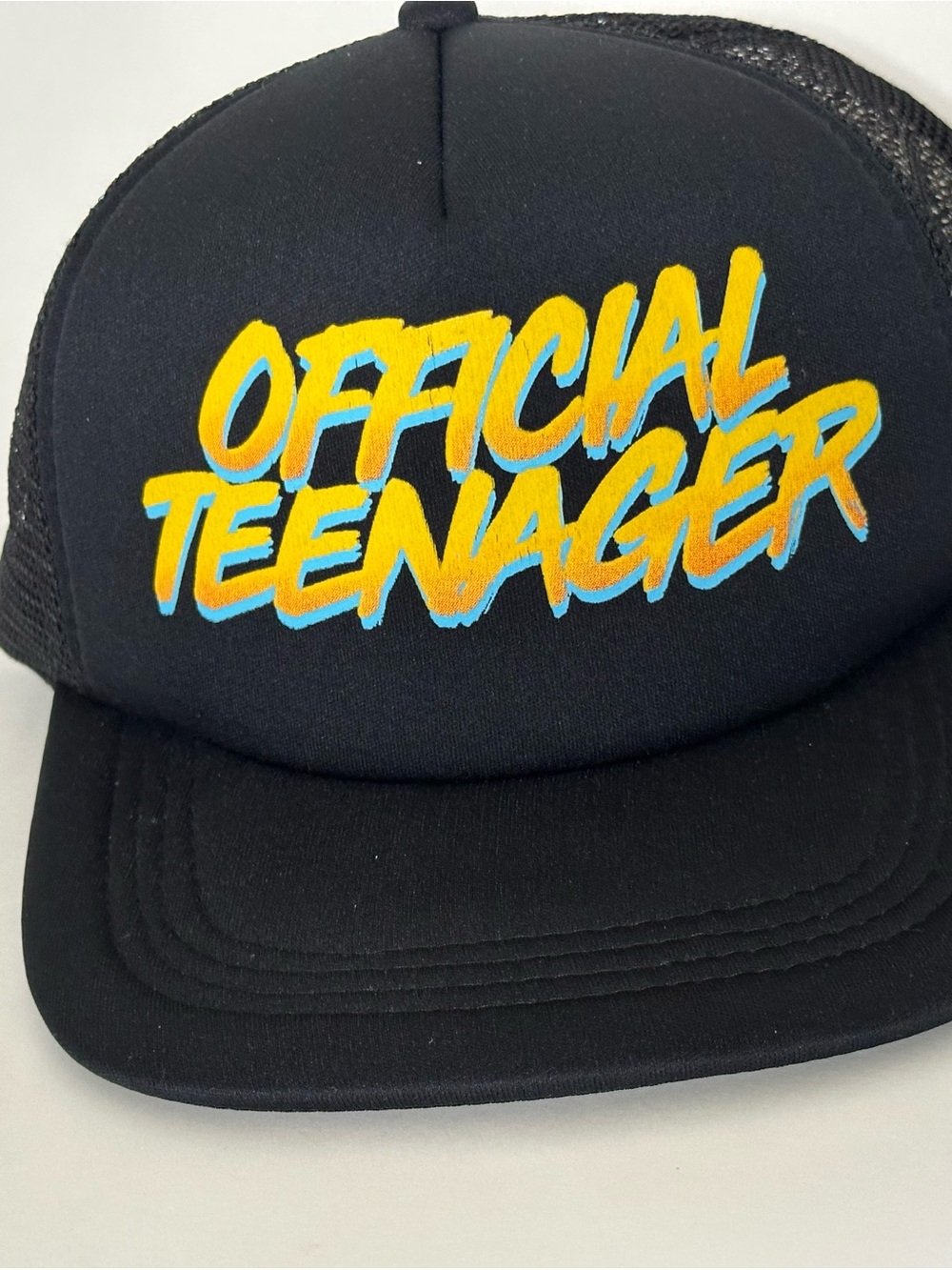 Official Teenager Black Trucker Hat with‎ Yellow & Blue Logo